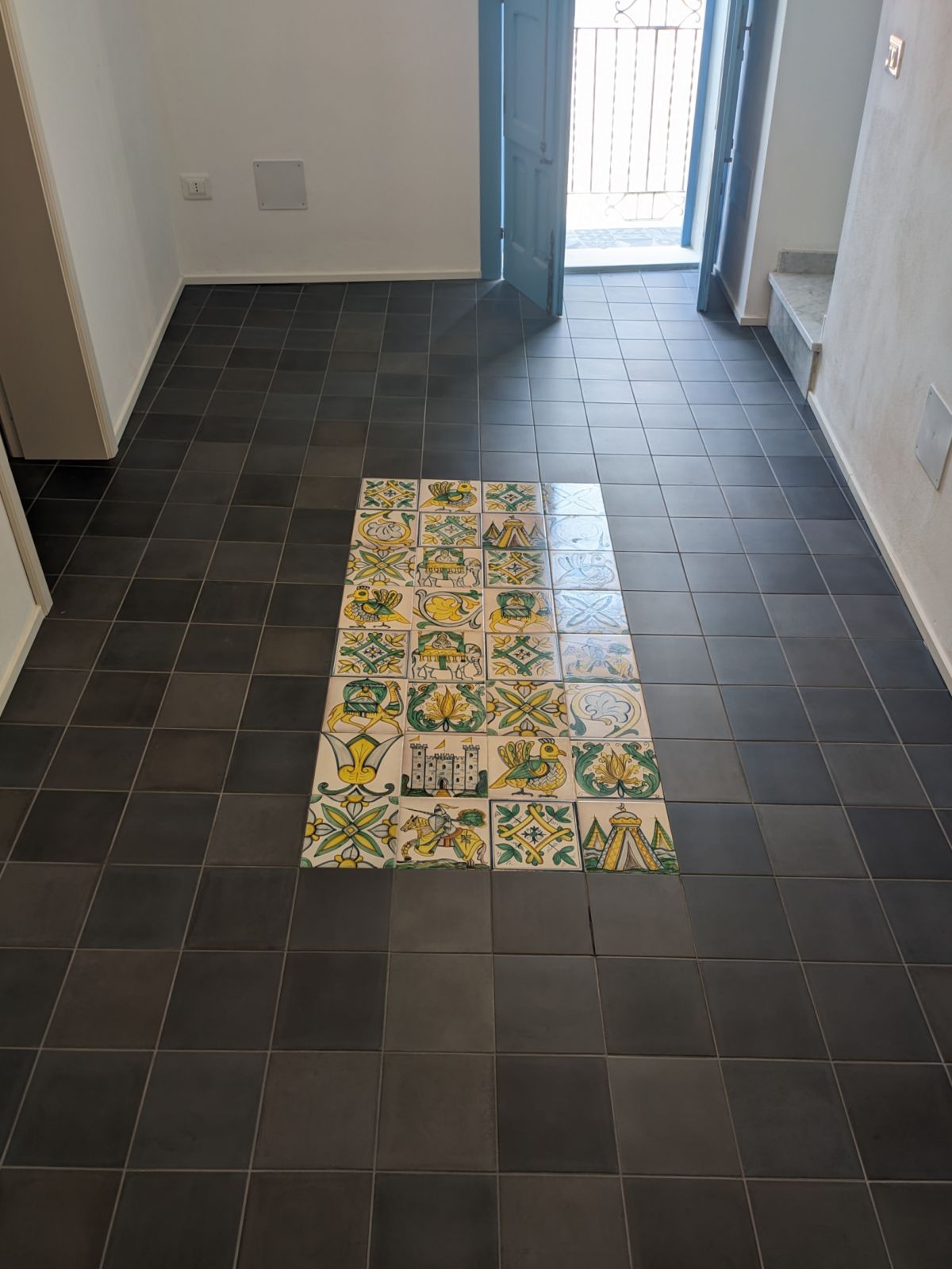 Porcelain soiled by building work, after treatment