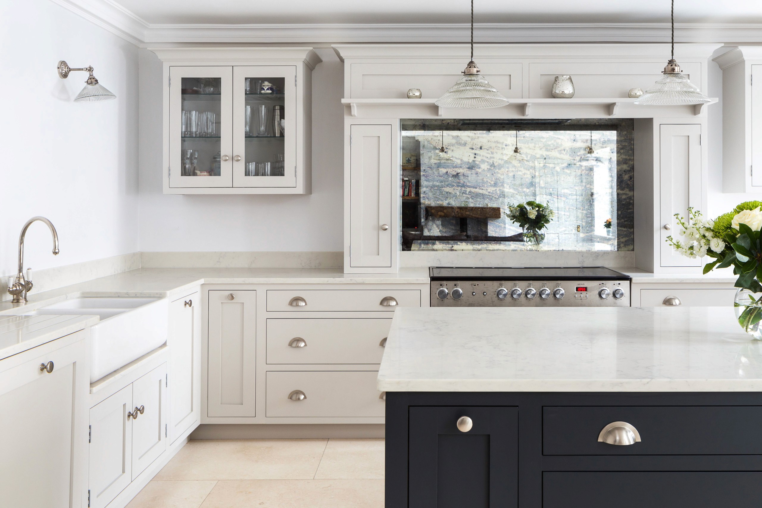 blue shaker kitchen island with curved edges