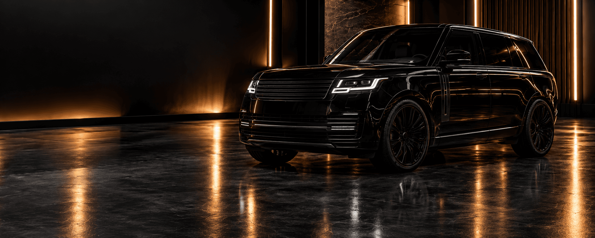 Black luxury SUV in a dark studio with copper light strips