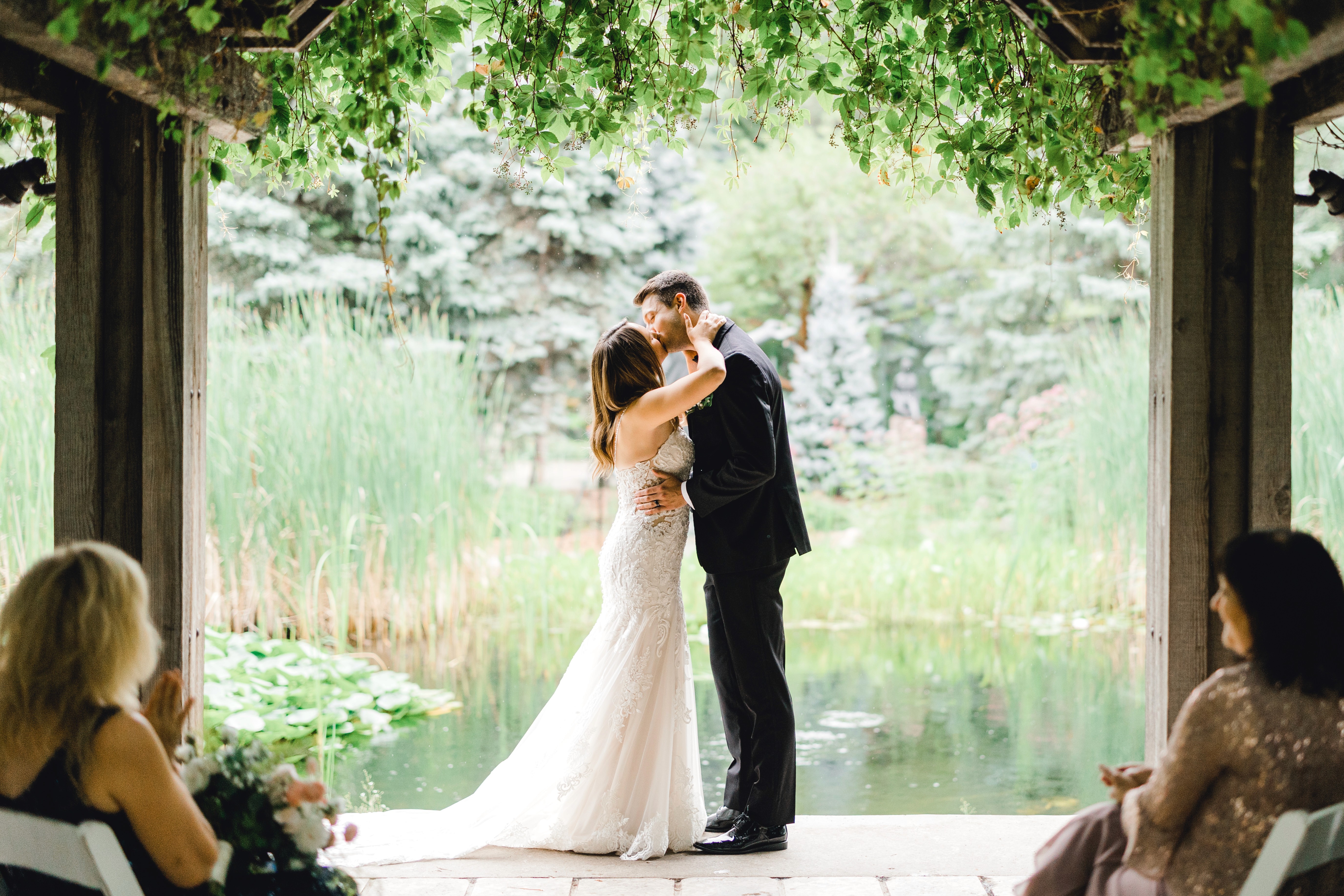 Wedding photography Brandon bride groom first kiss ceremony Manitoba
