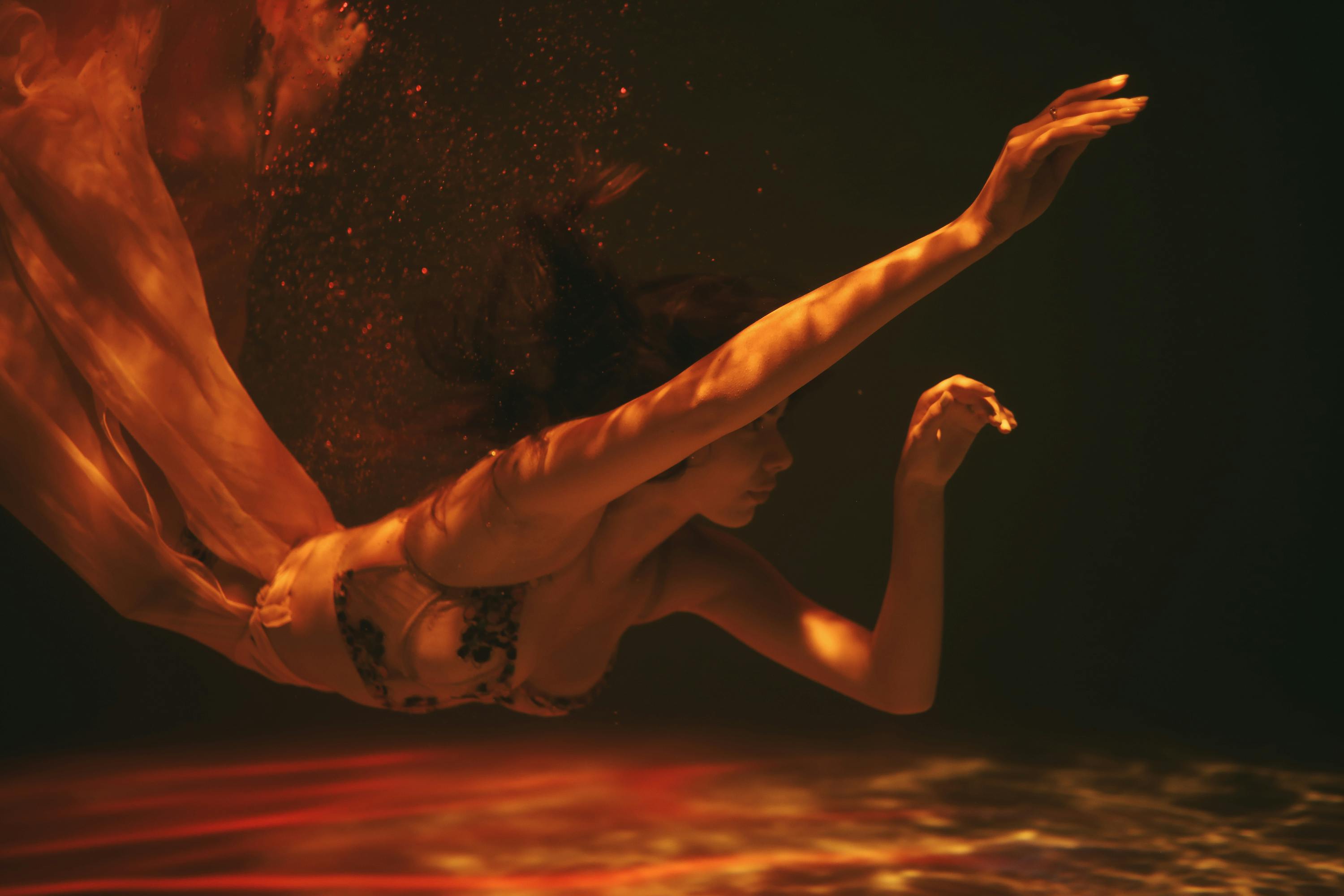 a magazine sitting on top of a brown leather couch