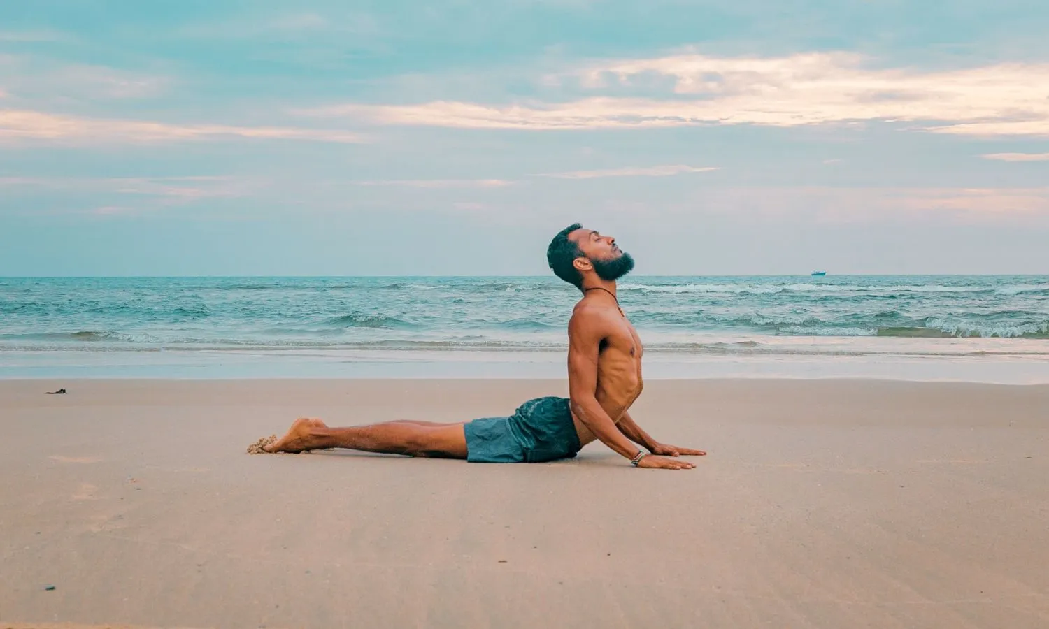Sri Sudarshan on a beach