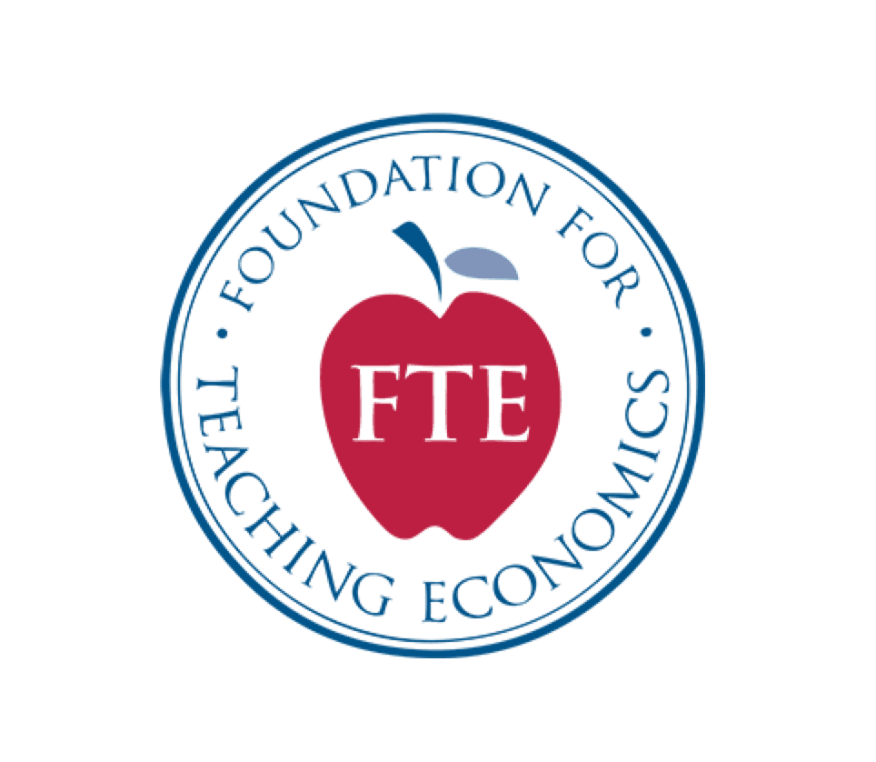 High school students studying economics and leadership concepts in a classroom setting