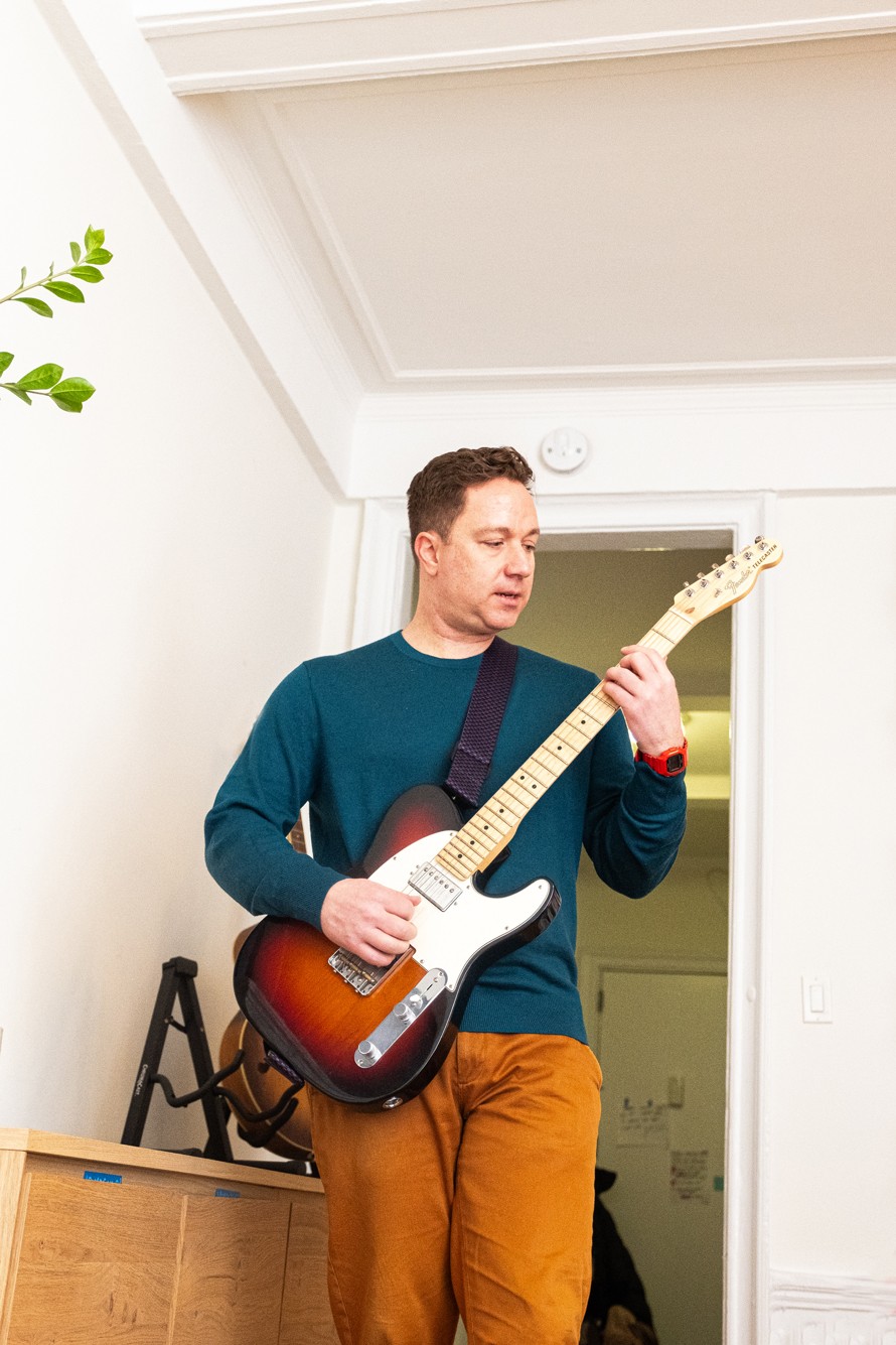 man-guitar-portrait-nyc-katt-jones-photography