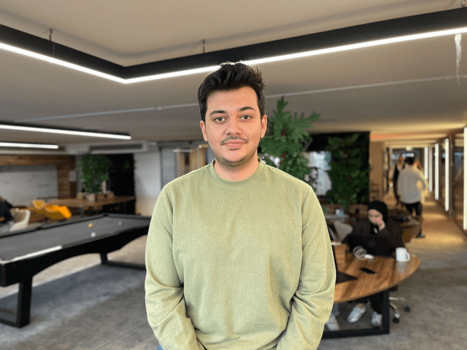 Alihan Gezer; UI/UX Designer working in the Neon Apps team.