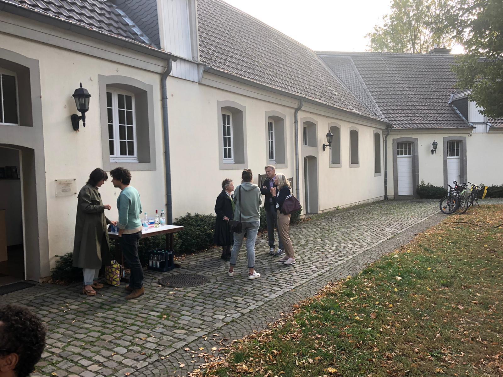 People outside the exhibition space