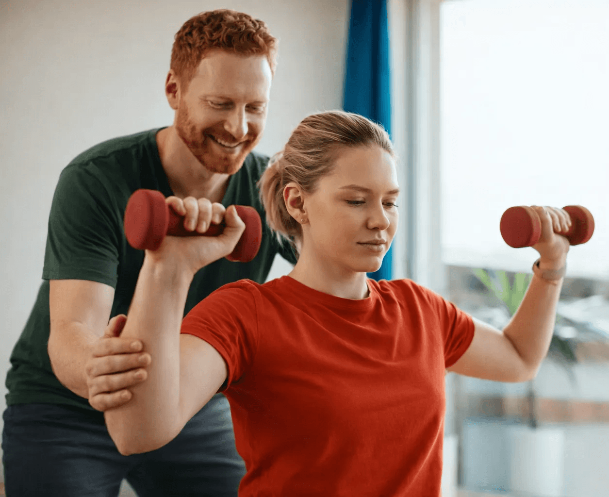Neura Health Couple smiling close together outdoors at dusk in a rocky landscape.