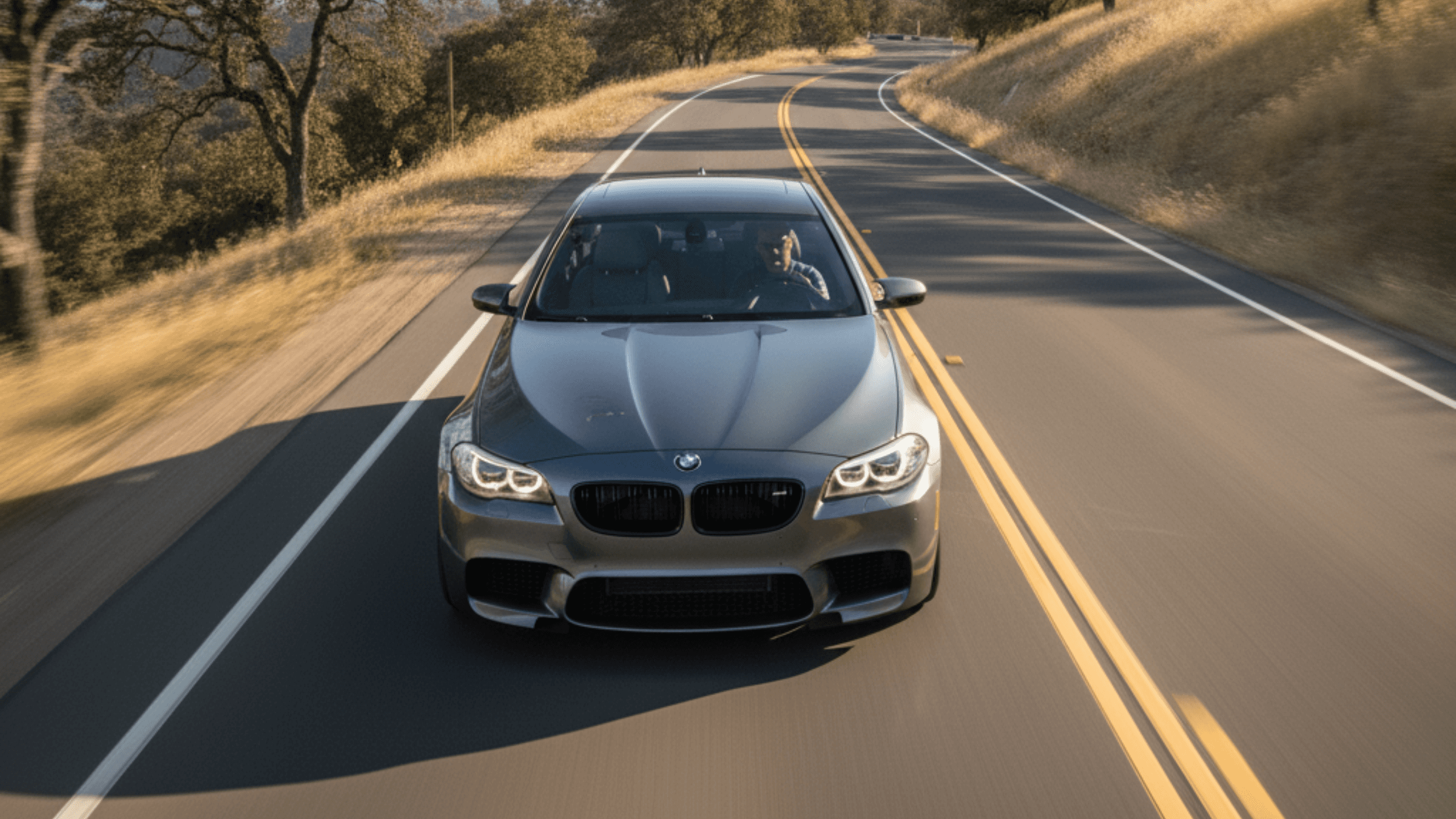 2015 BMW M5, a high-performance sports sedan from the F10 generation. 