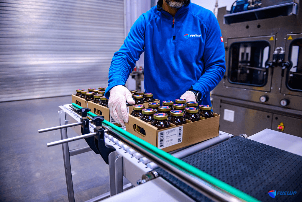 husband and wife working happily on a laptop