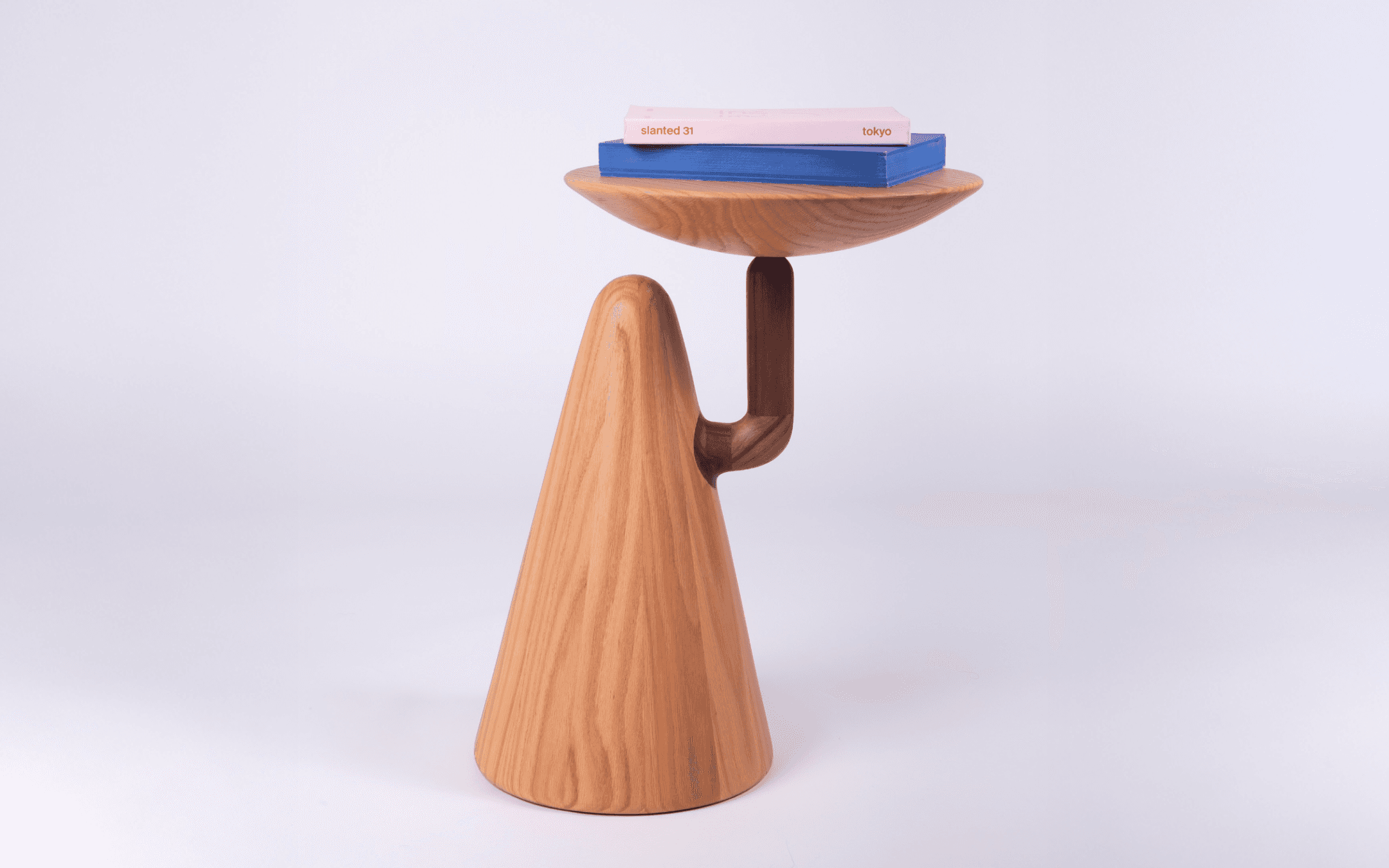 Handcrafted hatch dining table made out of solid oak and walnut, designed by noknok