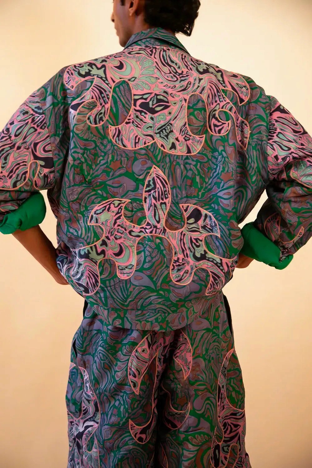 Our one-of-a-kind unisex dragon patchwork bomber and wide pant set is handcrafted by skilled artisans in-house using vintage textiles. 