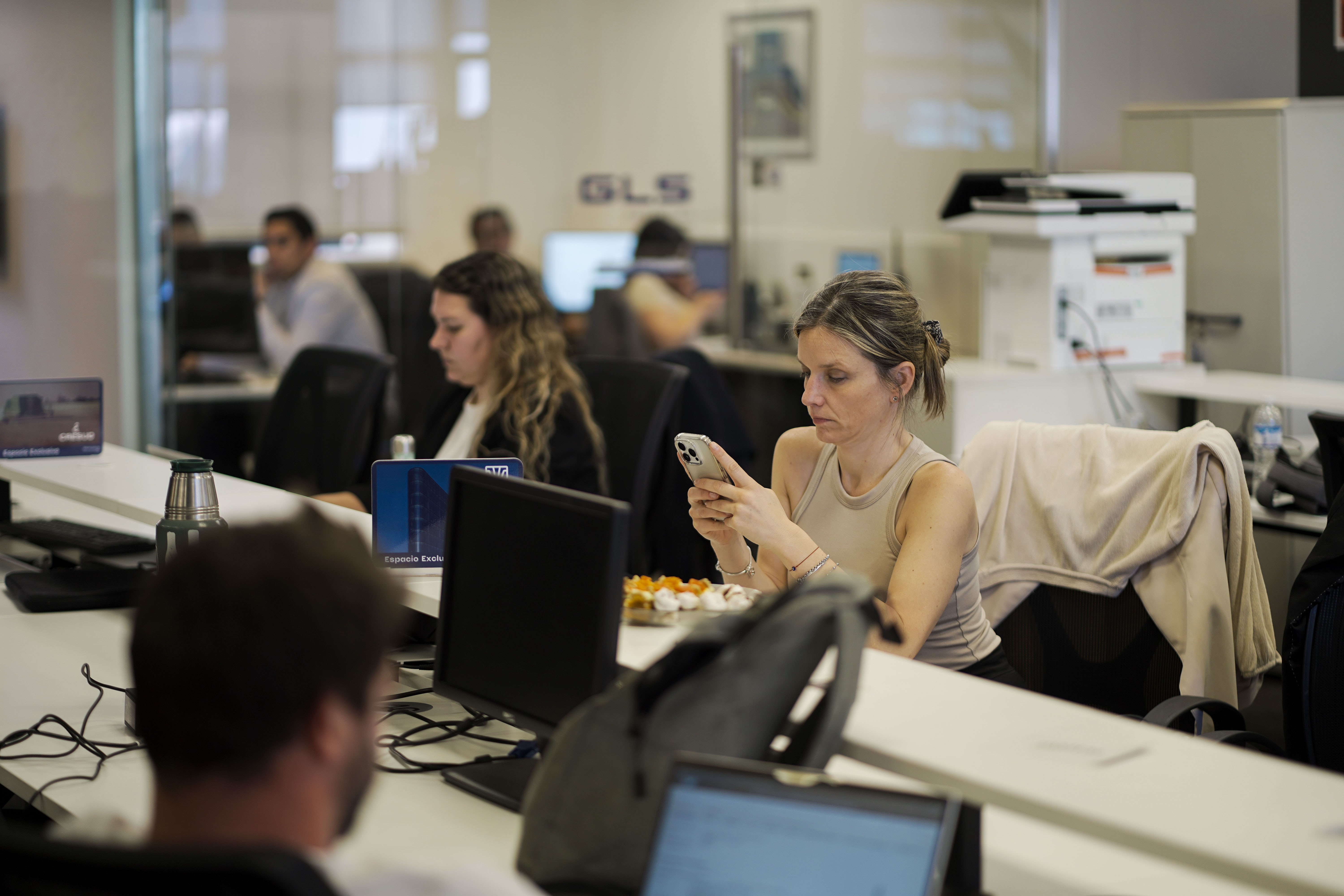 people sitting on chair near glass window during daytime