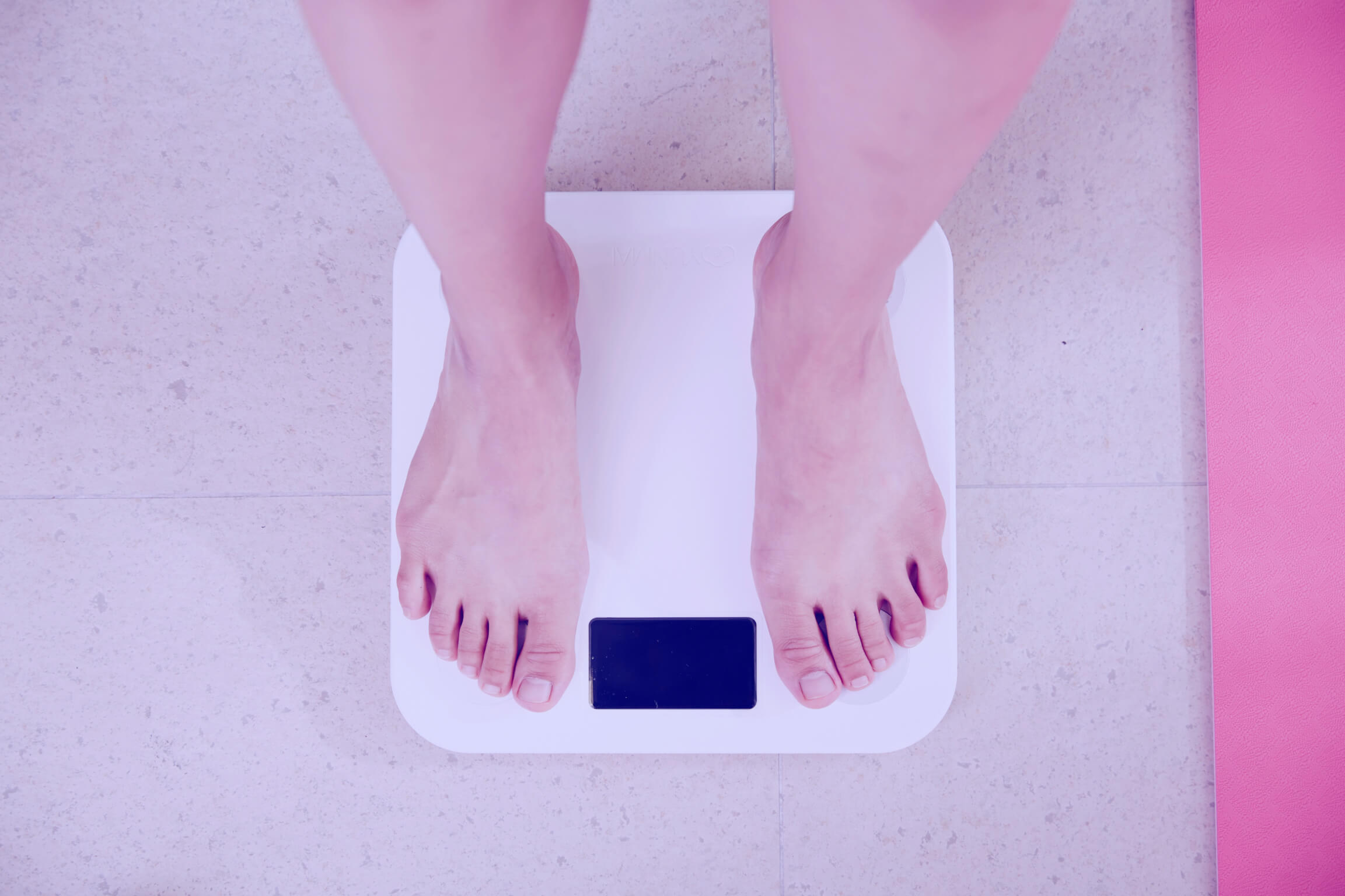 Weight loss scale woman bathroom