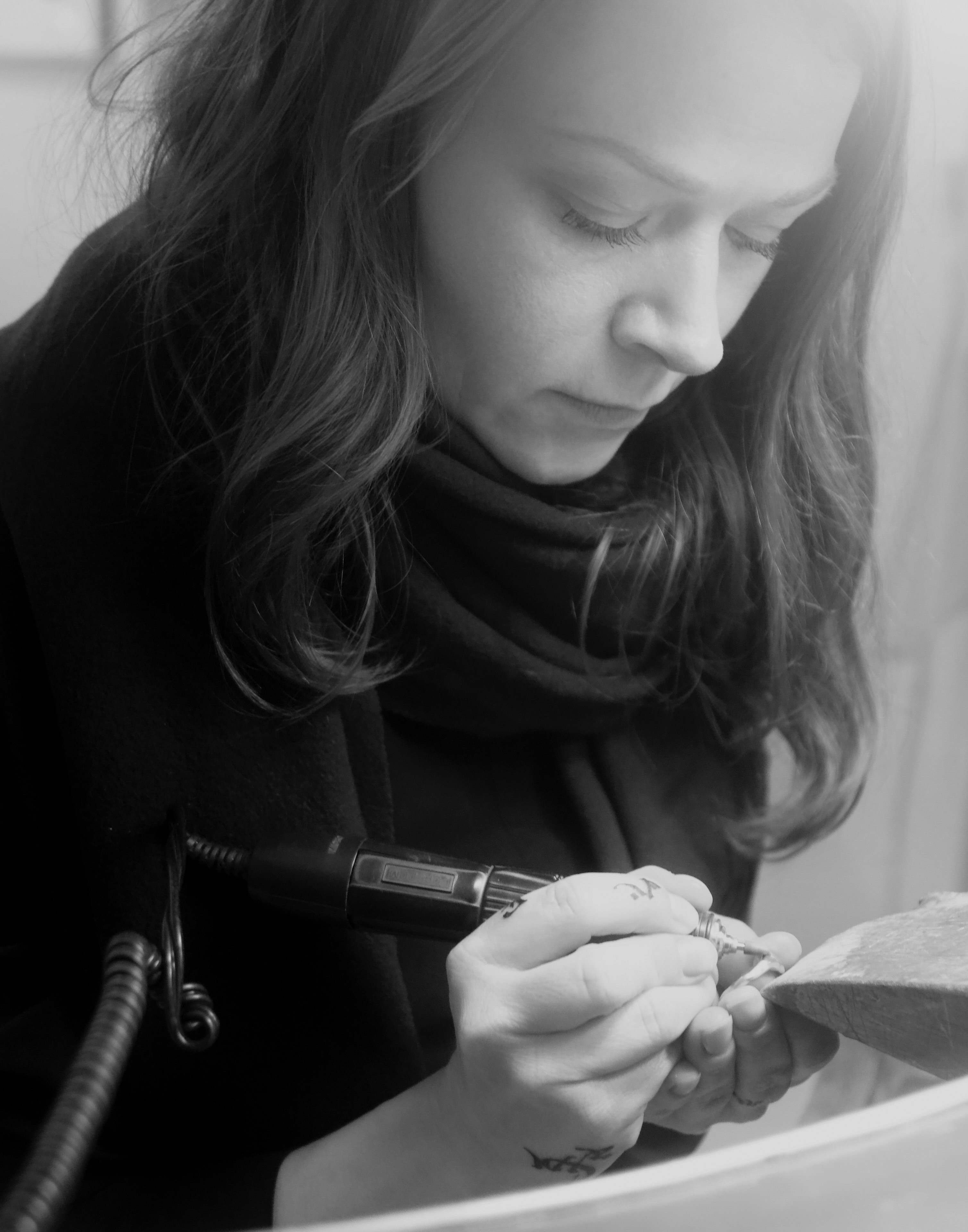 A close-up of a shelf with ceramic vases on it