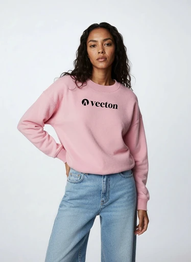 Virtual fashion model with wavy hair wearing pink Veeton sweatshirt and light blue jeans