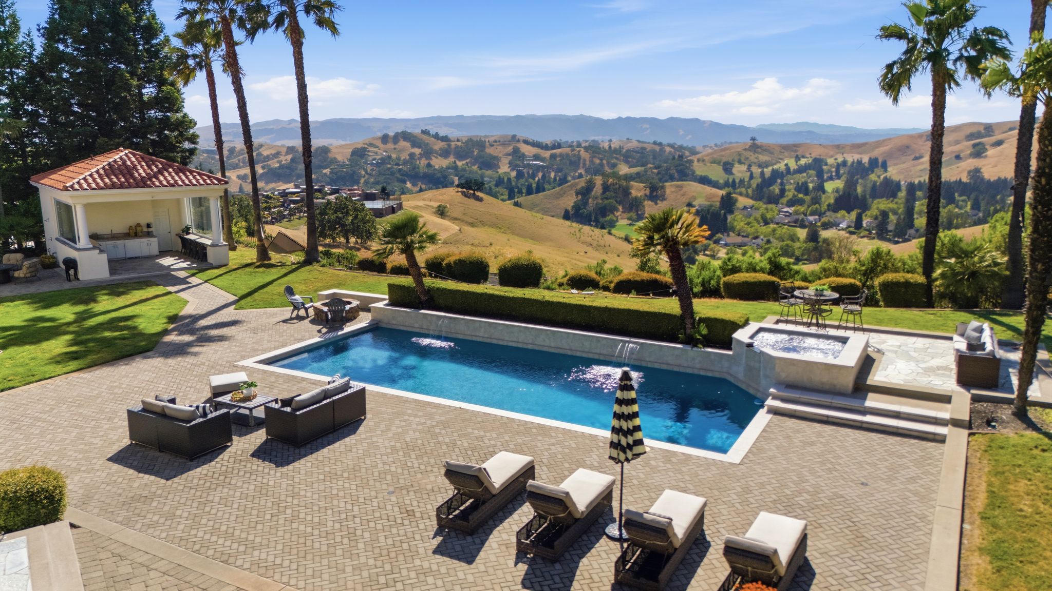 Pool with waterfalls and spa overlooking Mount Diablo views at 27 Eagle Ridge Lane in Blackhawk, Danville