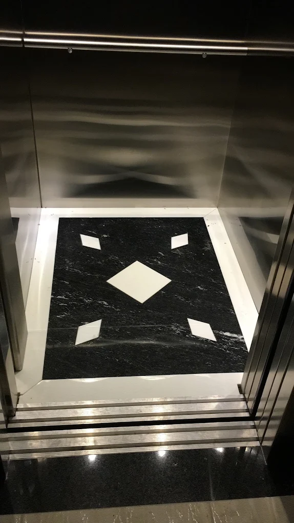 man sitting beside woman looking at a contract on DocuSign