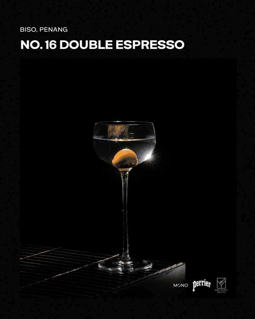 A beautifully presented Double Espresso cocktail served in a sleek glass, featuring a garnish and illuminated in a dramatic lighting setup.