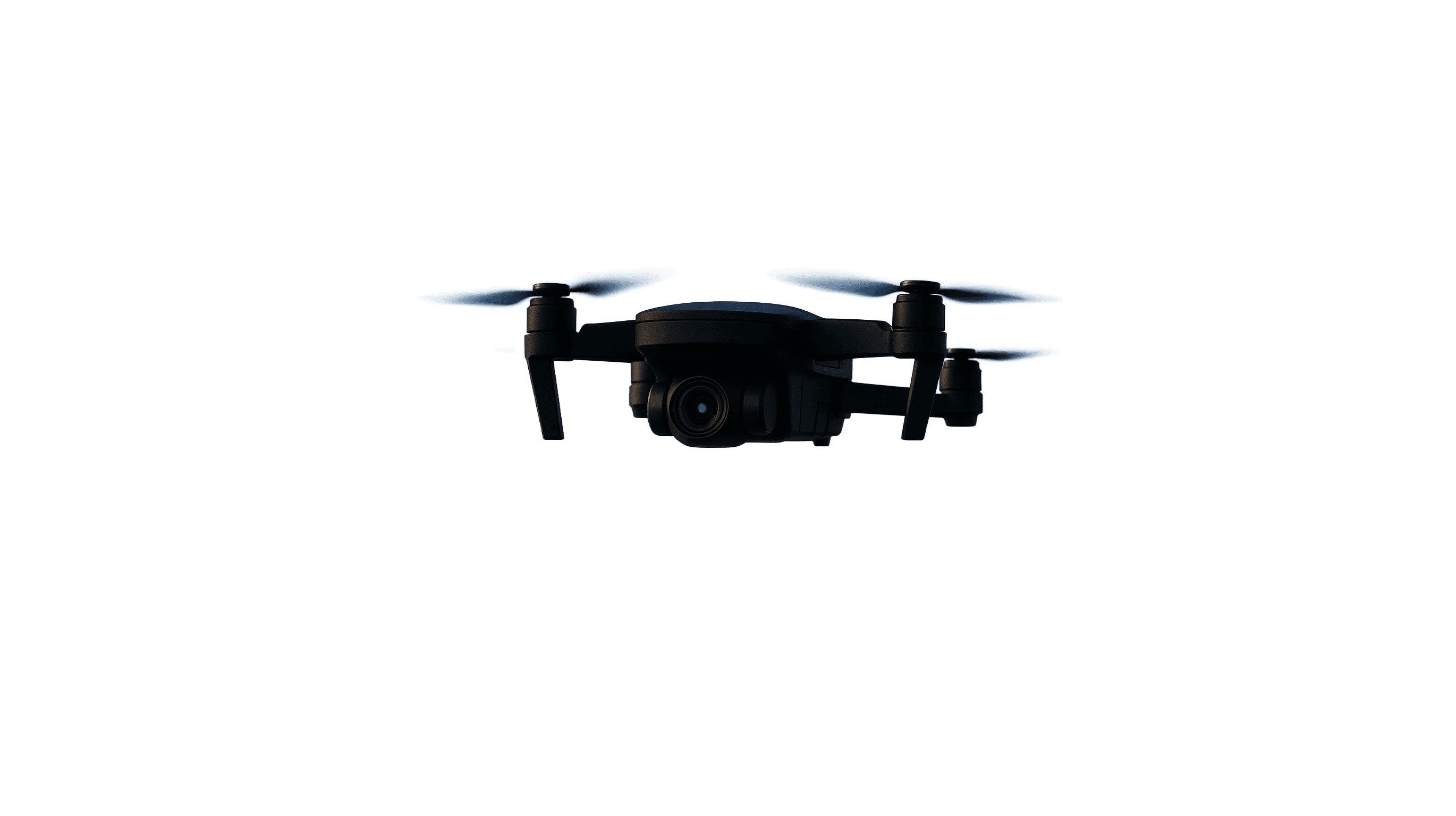 The image shows a sleek black drone hovering mid-air against a plain background, featuring four rotating propellers and a central camera unit for aerial photography.