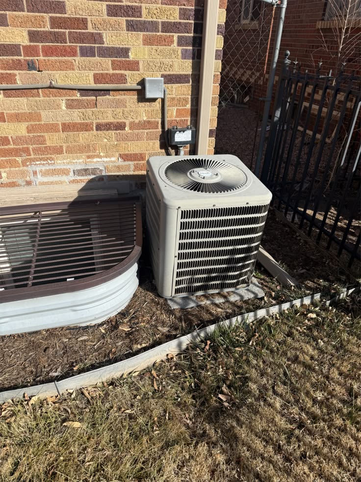 Brian and Hunter with MoJo Home Service truck in the background
