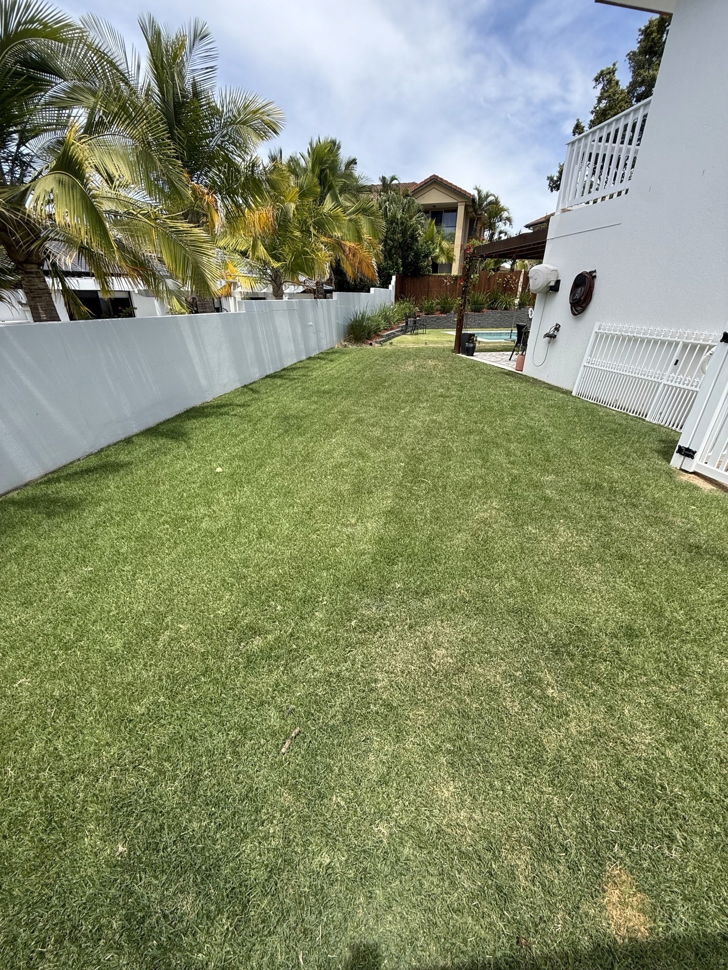 Professional lawn mowing and edging residential property Carrara Gold Coast