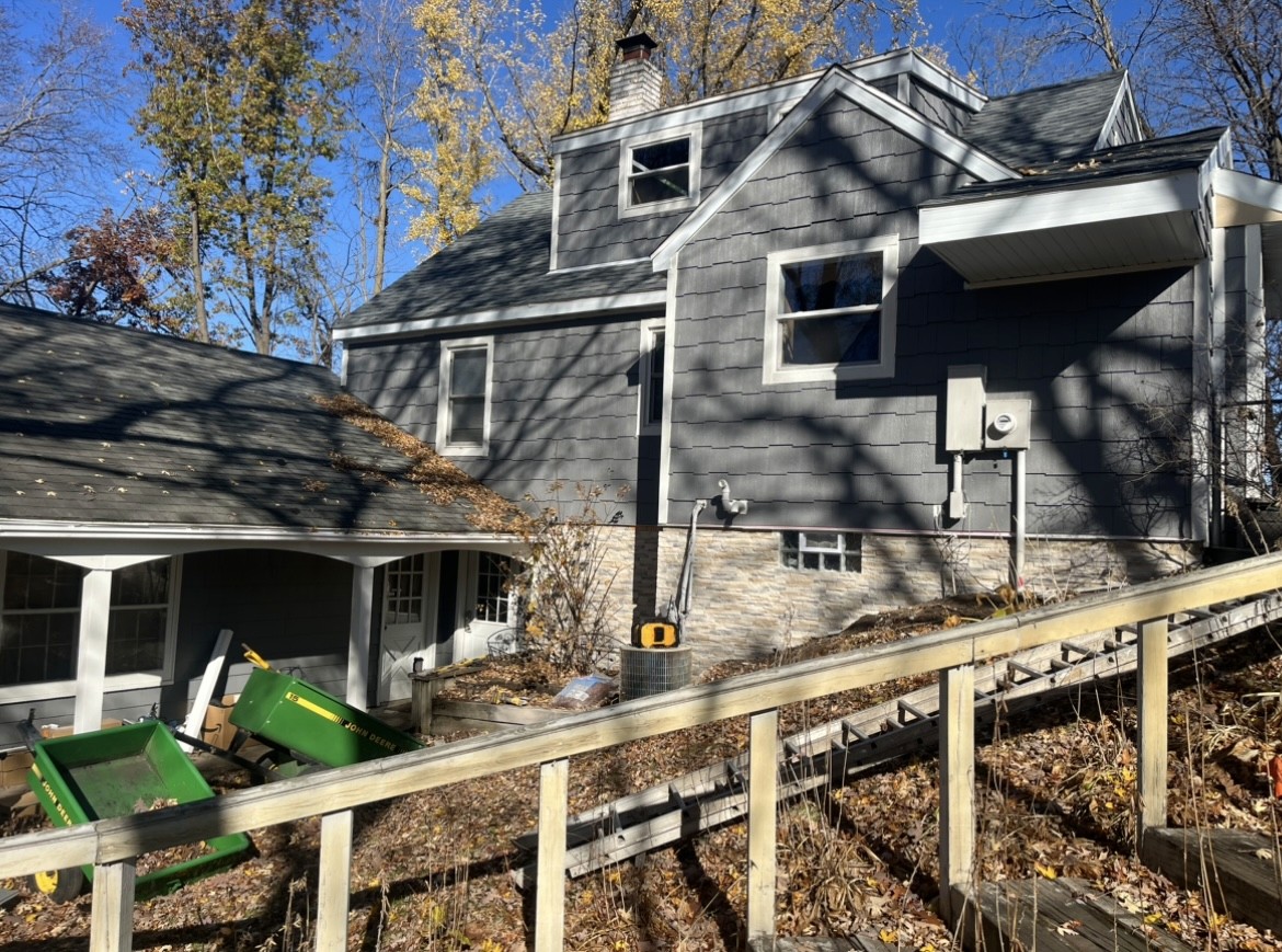 Back of house with dover gray lp shakes