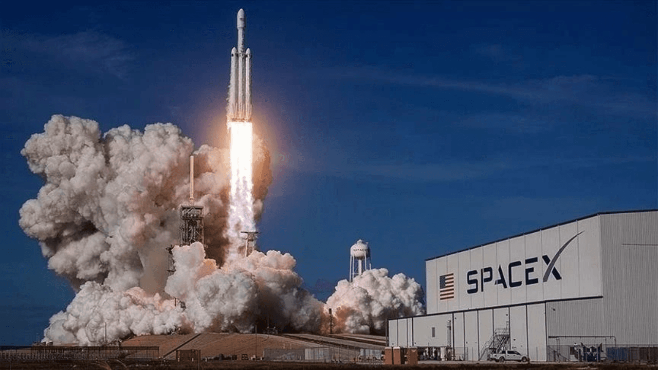 SpaceX, Falcon Heavy, lançamento foguetão, IPO SpaceX 2026, SPCX, Elon Musk, maior IPO da história, ações SpaceX Portugal, Starlink, Nasdaq 2026