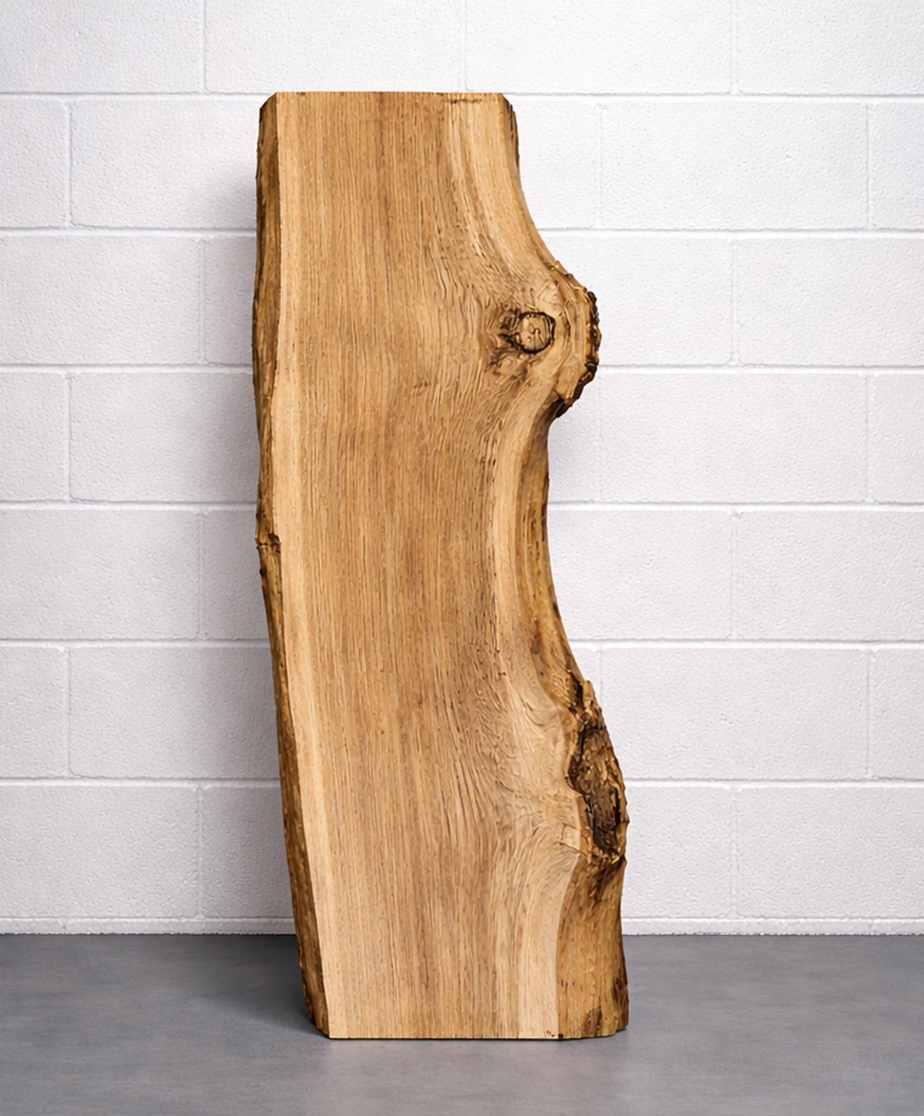Burr Oak No.&nbsp;06: live edge burr oak slab, 2160 × 840 × 50 mm, photographed standing upright against a white wall
