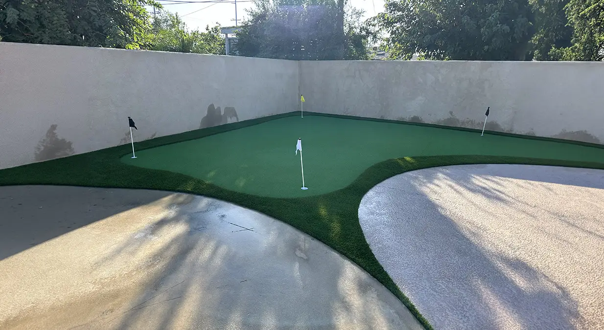 Modern artificial putting green with multiple holes installed in Fontana, California