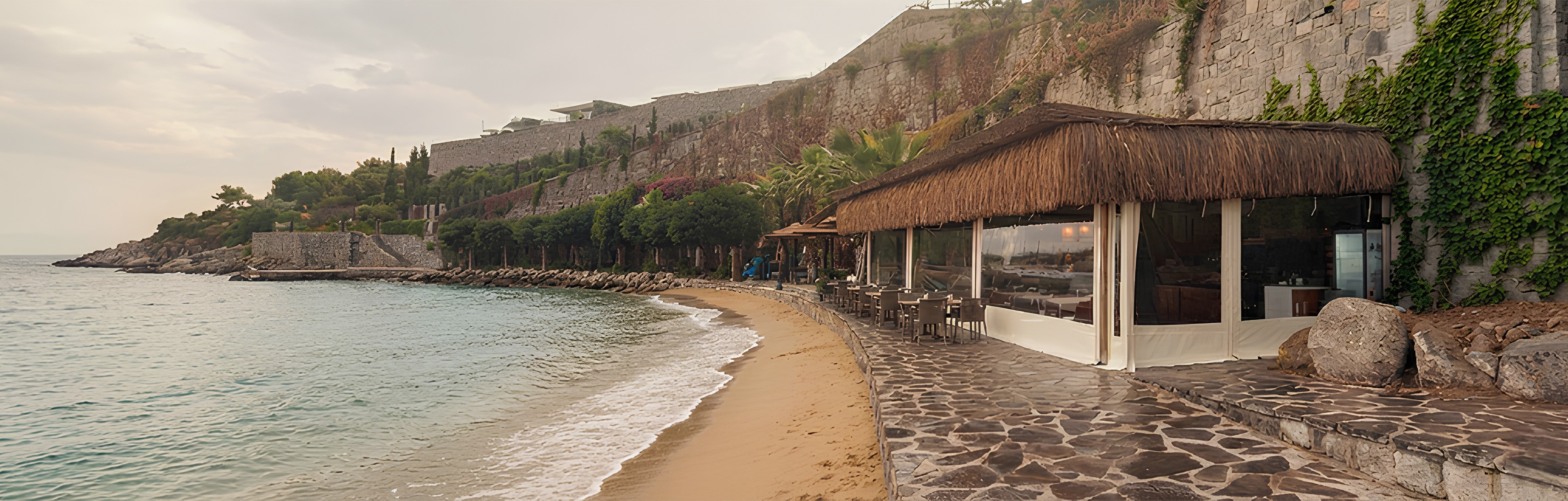 woman holding a phone and man looking at the phone. both are smiling