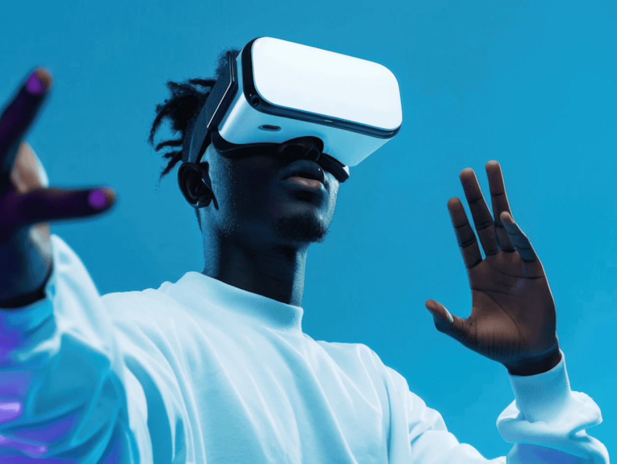 Person wearing a VR headset with hands raised against a blue background.