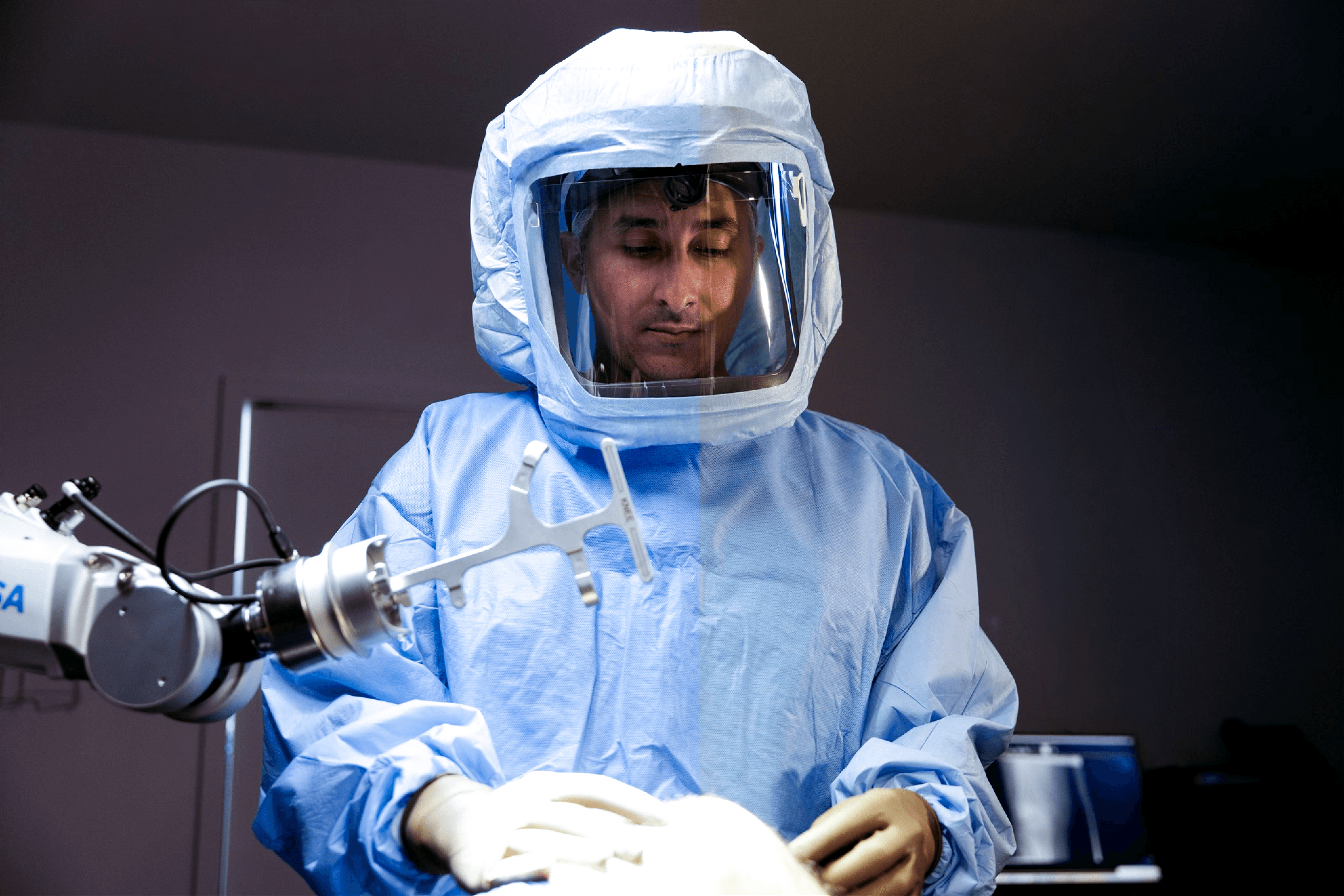Dr Morcos during knee replacement surgery with ROSA robotic system