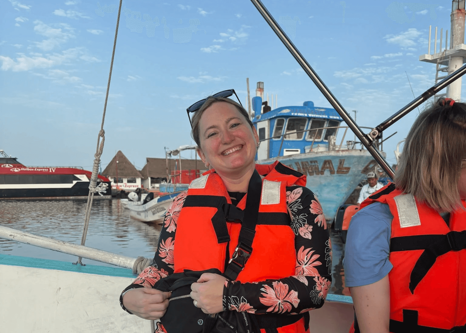 Mandy Gonzolaes smiling and getting ready to swim with whale sharks