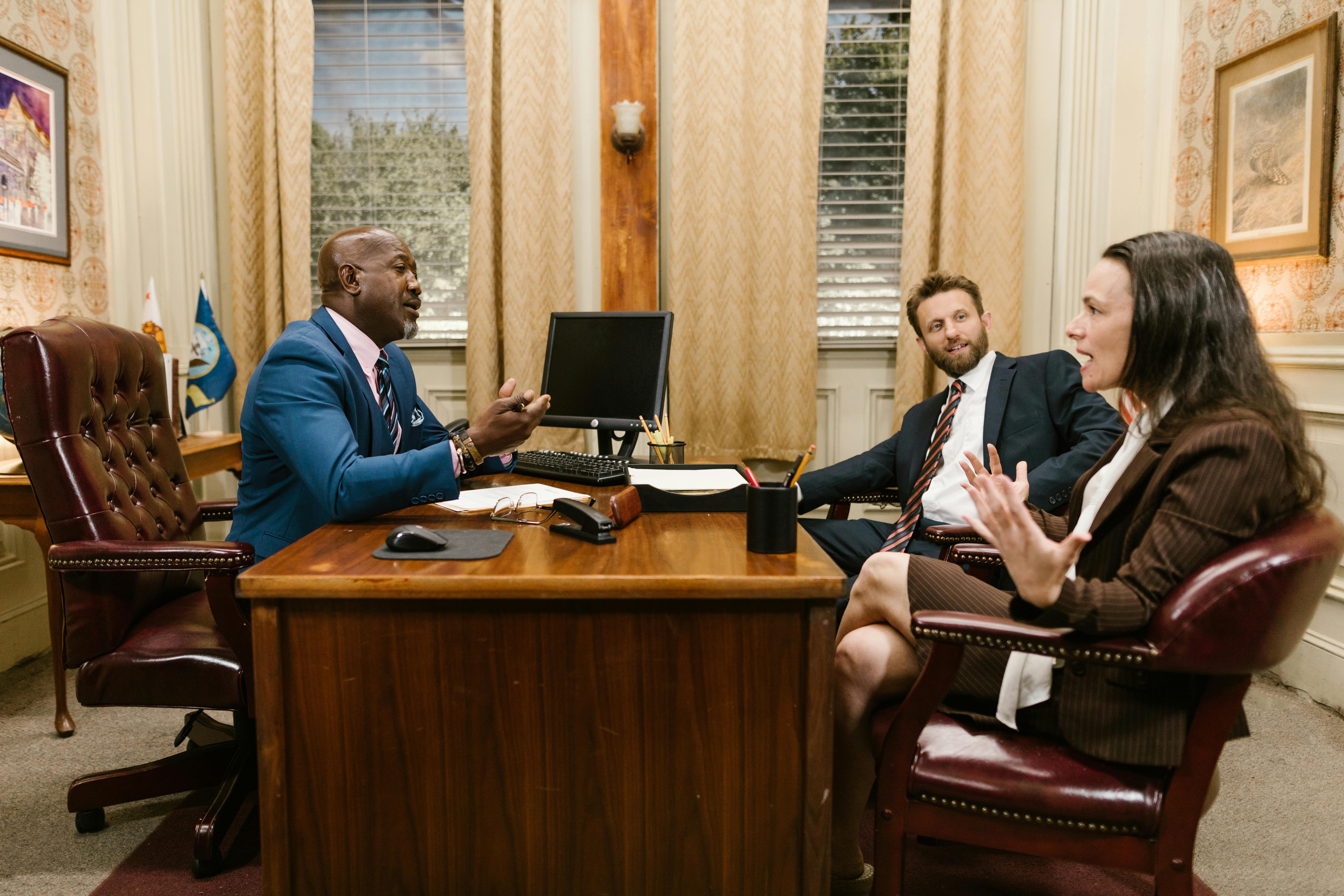 three-attorneys-in-a-legal-discussion-at-a-well-appointed-law-office. - rdne-stock-project (pexels)