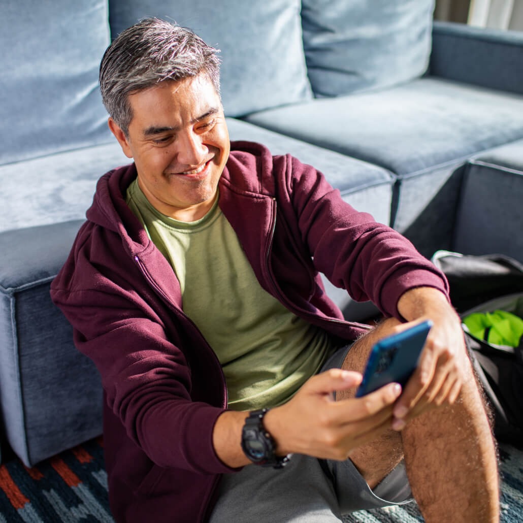 Man Smiling at phone