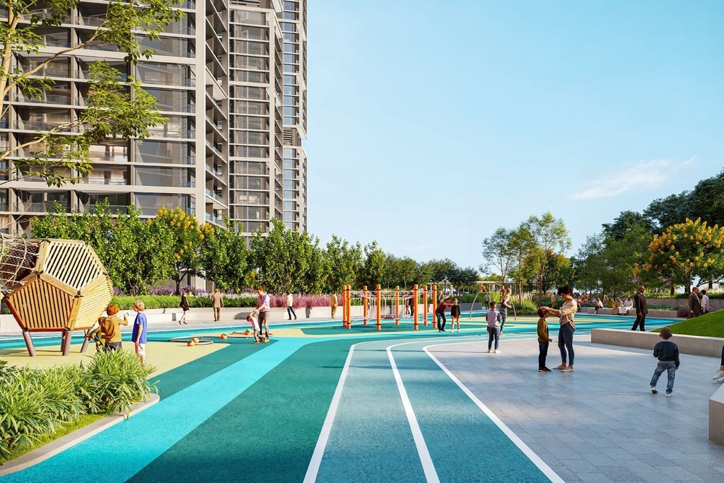 Artist's impression of the playground at The Mirage at Sobha Central, featuring colorful equipment and green landscaping.