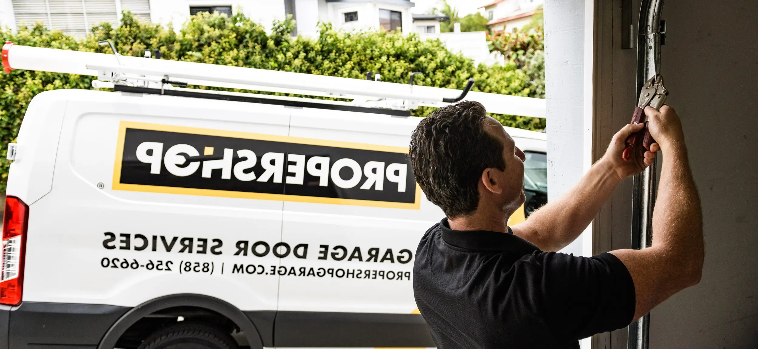 man standing in front of open doorway