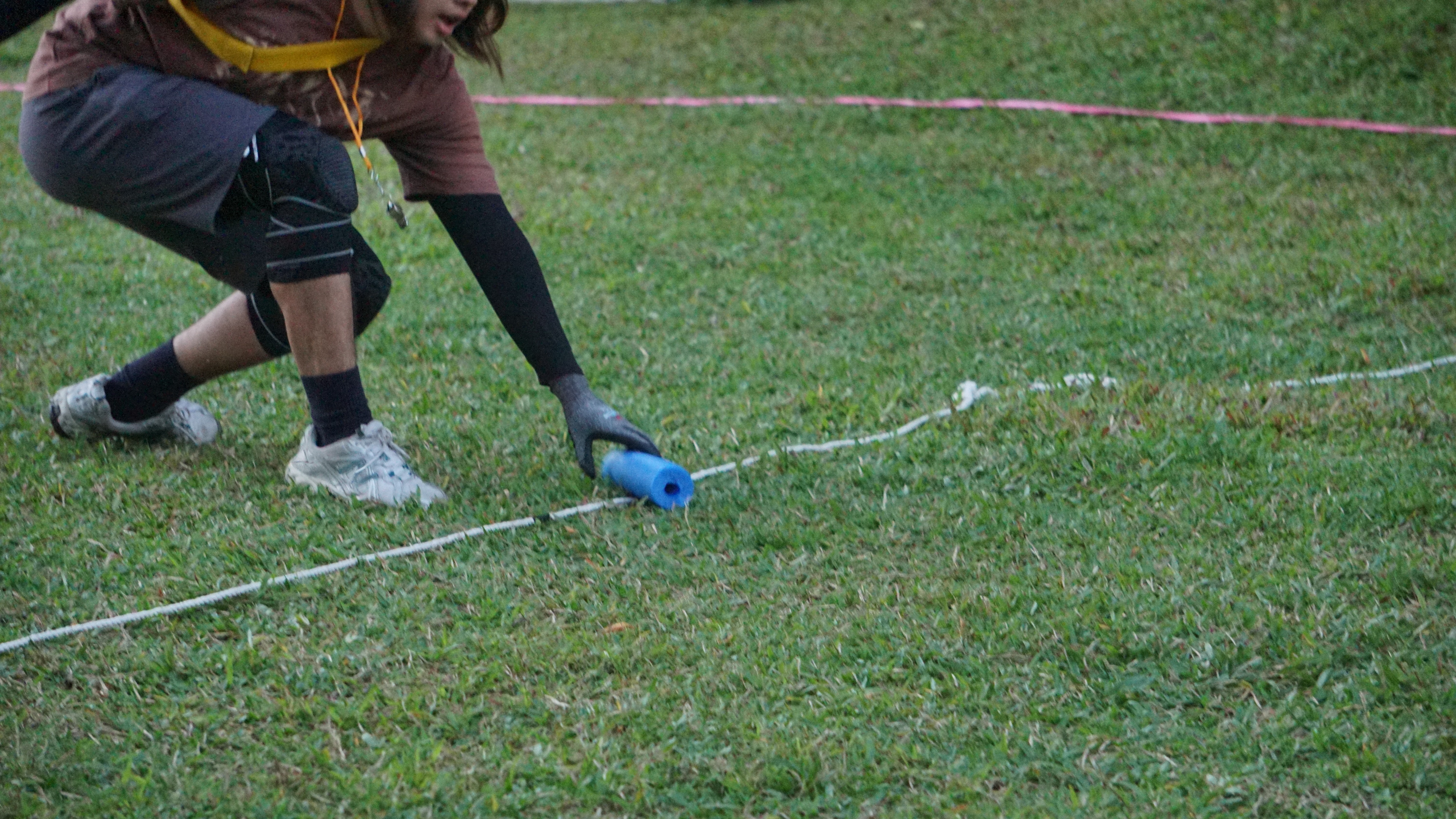 two people looking at a tablet and smiling