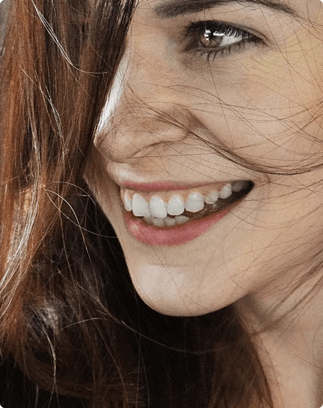 a young white woman smiling confidently