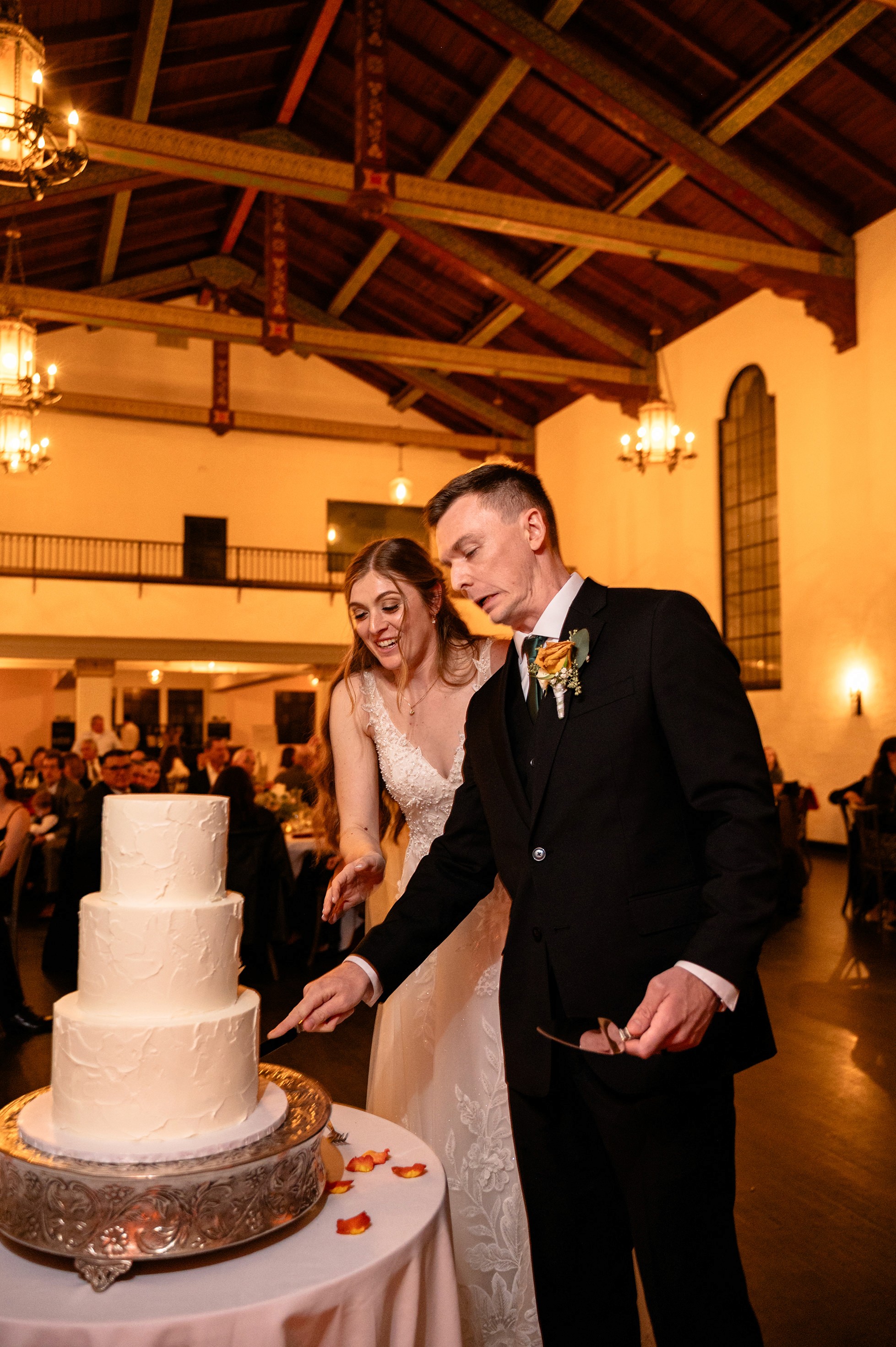 Flat lay wedding details with bouquet, rings, and sparkling bridal heels