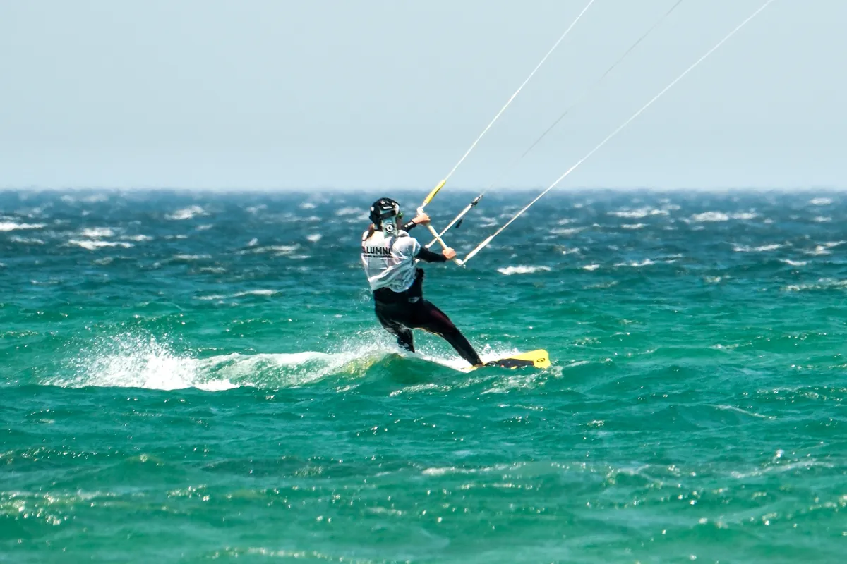 Intermediate kitesurfer riding both directions during a private kite course — Explora Watersports Tarifa