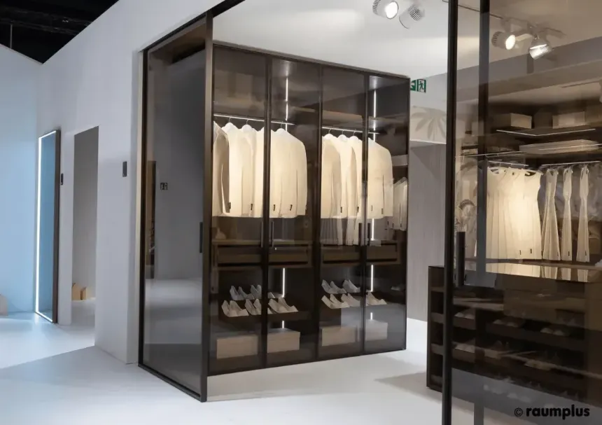dark cupboard filled with clothes