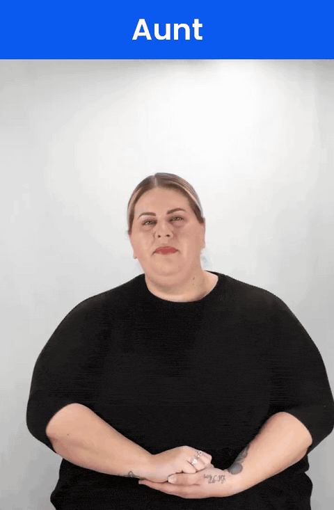 Animated GIF: a Deaf signer signs AUNT in ASL, an A hand twisting beside the cheek.