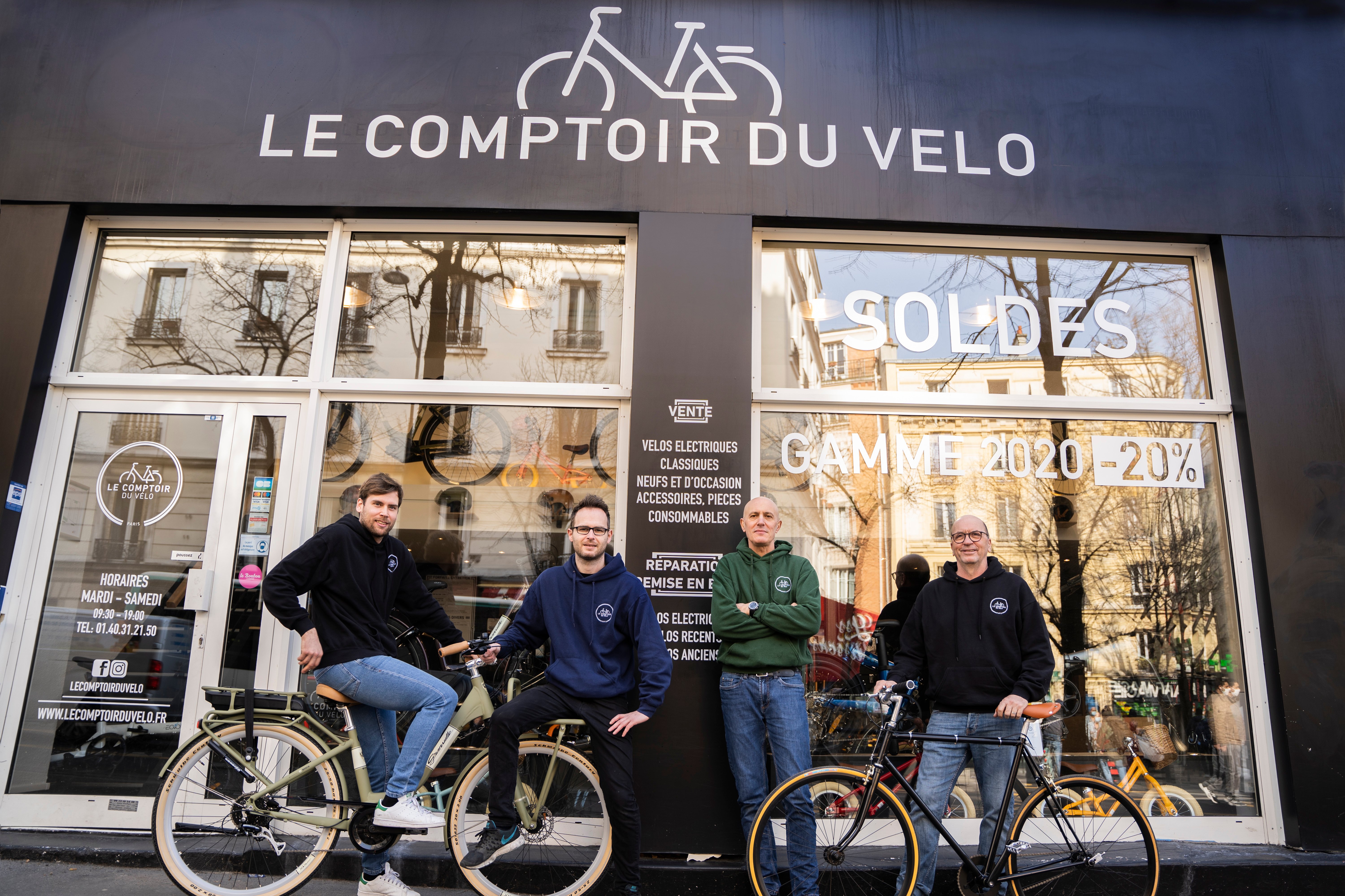 3 men on bikes talking