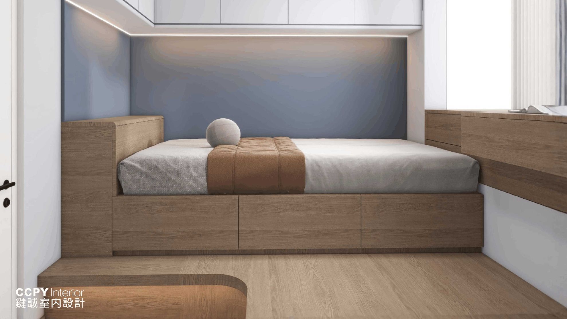 Modern bed with natural wood frame and blue wall