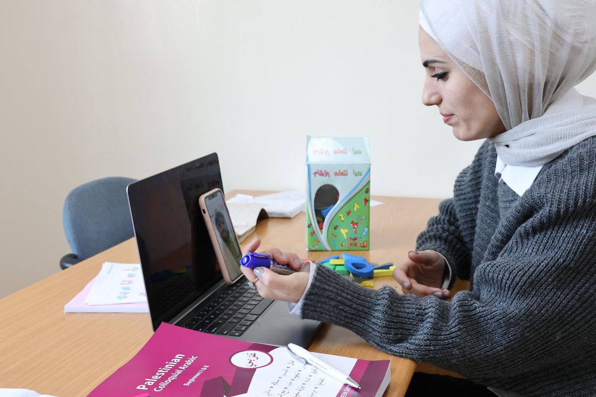 woman using laptop - Best Way to Learn Arabic Online