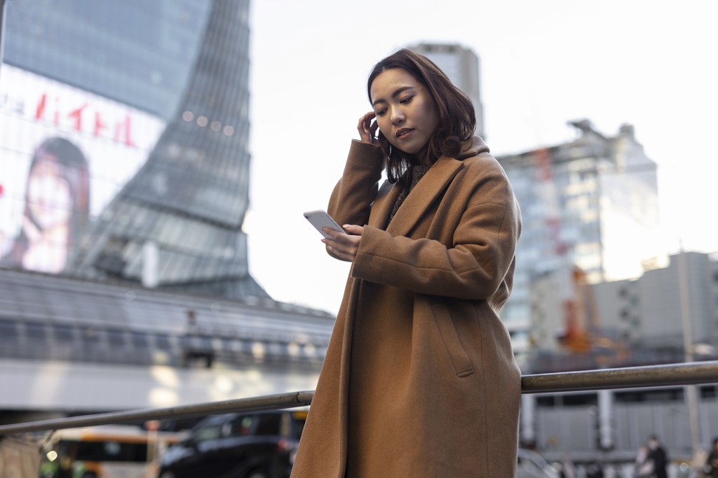 women using smartphone in Shinjuku