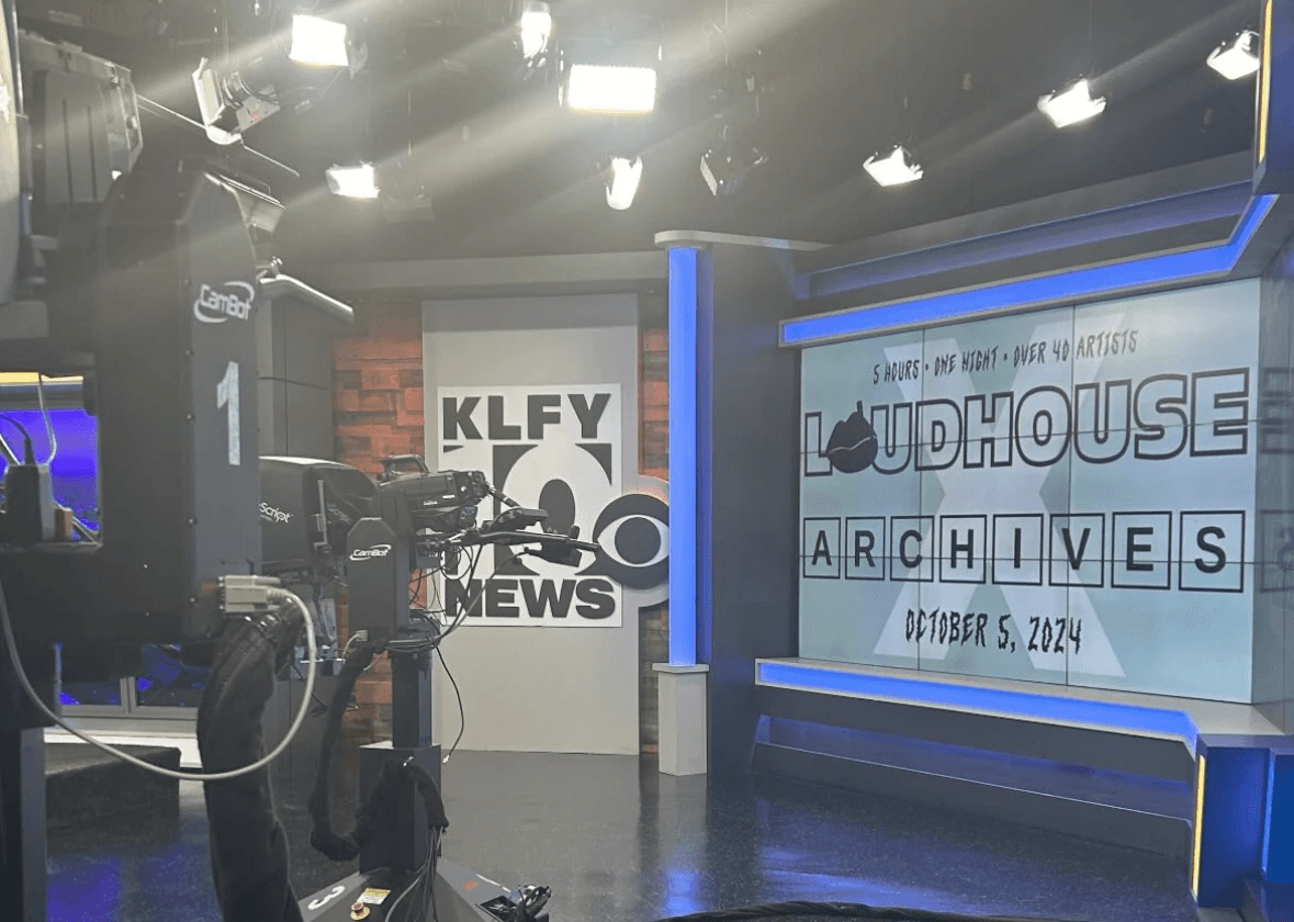 KLFY 10 News Station with a screen featured ARCHIVES and LoudHouse art collectives