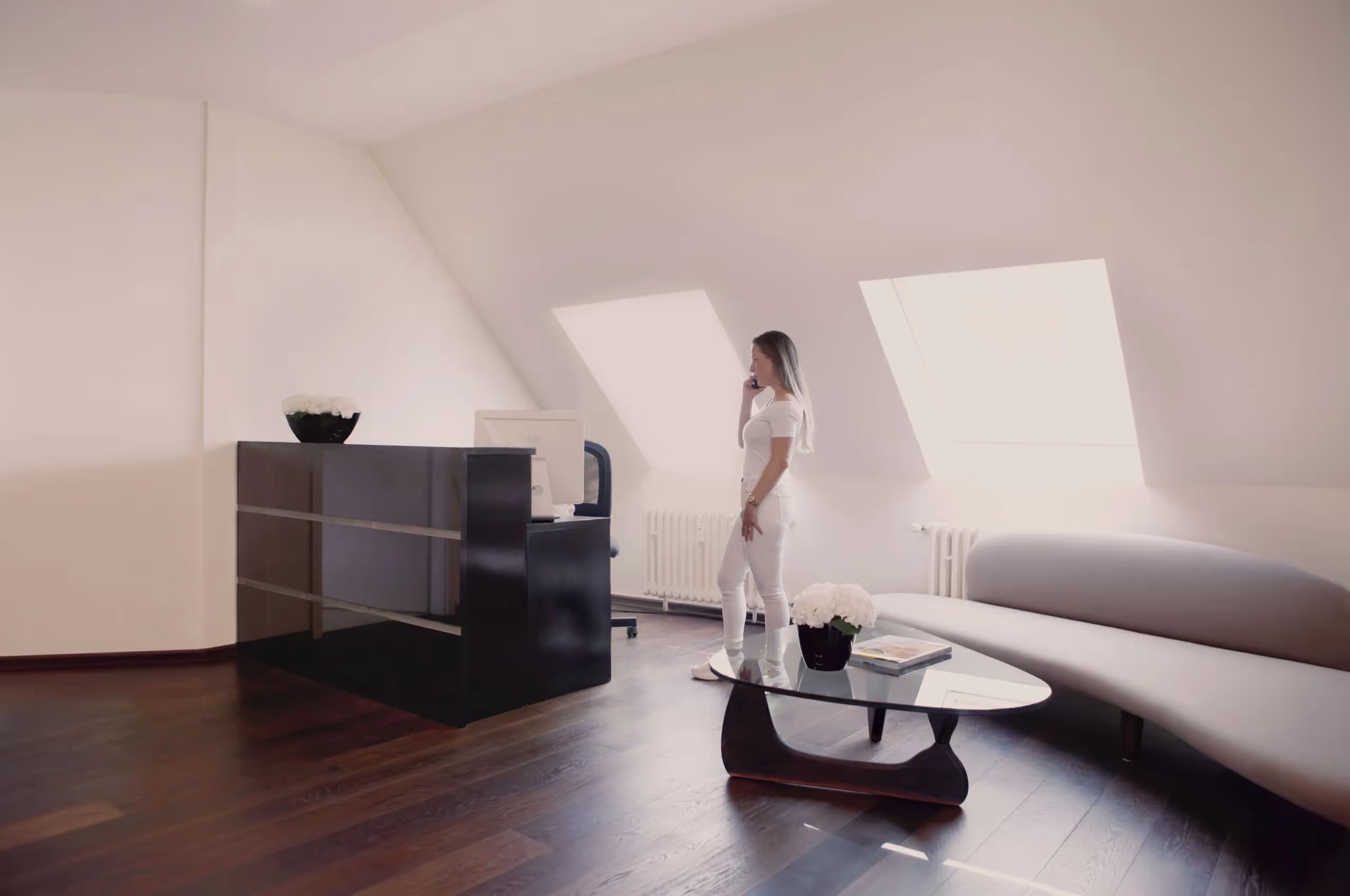 an orange and yellow background with a plane flying in the sky