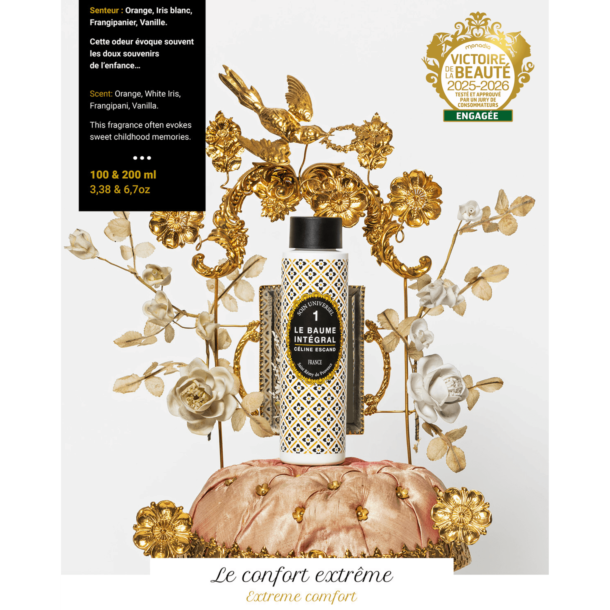 Flacon n°1 du Baume Intégral Céline Escand, soin universel bio parfumé à l’orange, iris blanc, frangipanier et vanille, présenté sur fond orné de fleurs et d’oiseaux dorés.